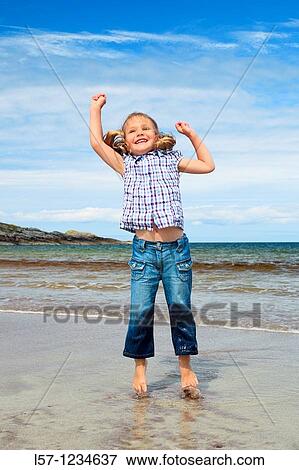 girl playing on sandy beach, Sutherland, Scotland View Large Photo Image Stock Photo - girl playing on sandy beach, Sutherland, Scotland. Fotosearch