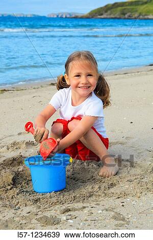girl playing on sandy beach, Sutherland, Scotland View Large Photo Image Stock Photo - girl playing on sandy beach, Sutherland, Scotland. Fotosearch