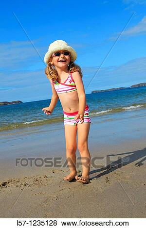 girl playing on sandy beach, Sutherland, Scotland View Large Photo Image Stock Photo - girl playing on sandy beach, Sutherland, Scotland. Fotosearch