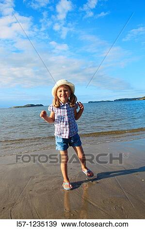 girl playing on sandy beach, Sutherland, Scotland View Large Photo Image Stock Photo - girl playing on sandy beach, Sutherland, Scotland. Fotosearch