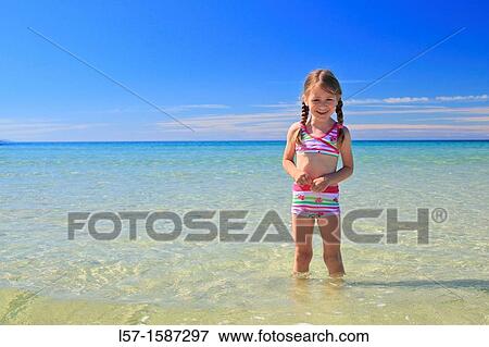 girl playing on sandy beach, Sutherland, Scotland View Large Photo Image Stock Photo - girl playing on sandy beach, Sutherland, Scotland. Fotosearch