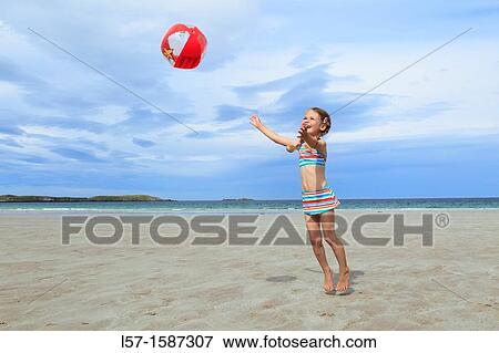 girl playing on sandy beach, Sutherland, Scotland View Large Photo Image Stock Photo - girl playing on sandy beach, Sutherland, Scotland. Fotosearch