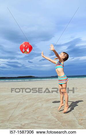 girl playing on sandy beach, Sutherland, Scotland View Large Photo Image Stock Photograph - girl playing on sandy beach, Sutherland, Scotland. Fotosearch
