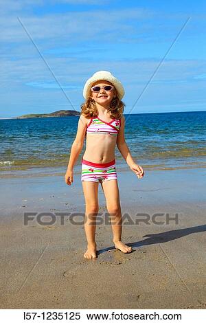 girl playing on sandy beach, Sutherland, Scotland View Large Photo Image Stock Photography - girl playing on sandy beach, Sutherland, Scotland. Fotosearch