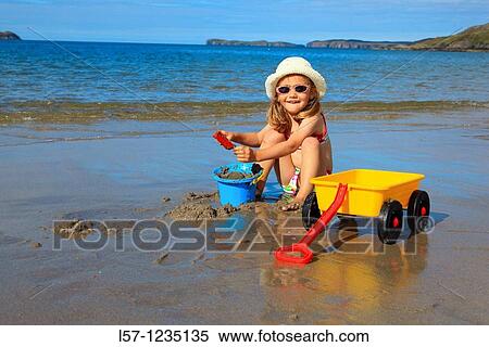 girl playing on sandy beach, Sutherland, Scotland View Large Photo Image Stock Photography - girl playing on sandy beach, Sutherland, Scotland. Fotosearch