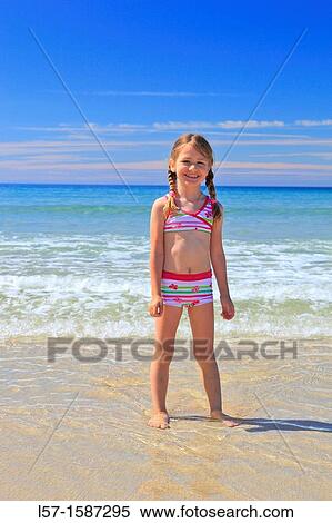 girl playing on sandy beach, Sutherland, Scotland View Large Photo Image Stock Photography - girl playing on sandy beach, Sutherland, Scotland. Fotosearch
