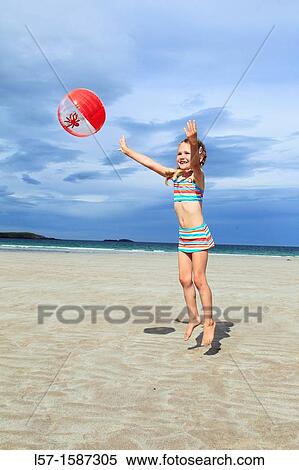 girl playing on sandy beach, Sutherland, Scotland View Large Photo Image Stock Photography - girl playing on sandy beach, Sutherland, Scotland. Fotosearch