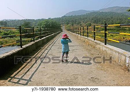 Girl playing outdoors, Pune, Maharashtra, India View Large Photo Image Stock Image - Girl playing outdoors, Pune, Maharashtra, India. Fotosearch