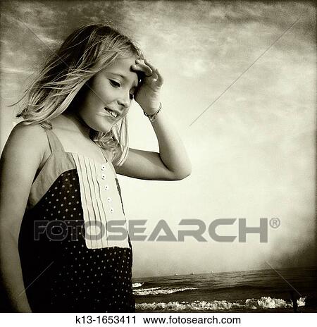 Girl playing with the waves Huelva, Andalucia, Spain View Large Photo Image Stock Image - Girl playing with the waves Huelva, Andalucia, Spain. Fotosearch