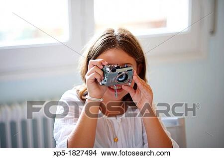 Girl plays with broken camera View Large Photo Image Picture - Girl plays with broken camera. Fotosearch