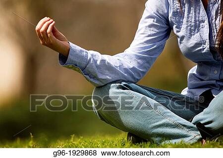 Stock Photo - girl practicing yoga. Fotosearch