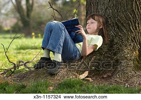 Girl reading View Large Photo Image Picture - Girl reading. Fotosearch