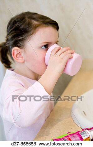 Girl rinsing her mouth View Large Photo Image Stock Photo - Girl rinsing her mouth. Fotosearch