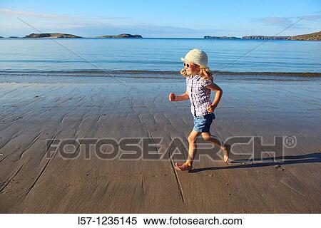 girl running on sandy beach, Sutherland, Scotland View Large Photo Image Stock Photography - girl running on sandy beach, Sutherland, Scotland. Fotosearch