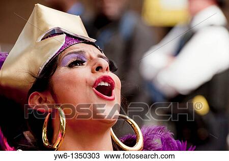 Stock Image - Girl singing at the Notting Hill Carnival 2010 in London. Fotosearch
