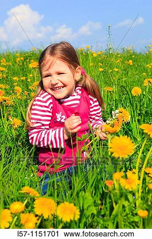 girl sitting in field of Dandelions, Zuercher Oberland, Zuerich, Switzerland View Large Photo Image Stock Image - girl sitting in field of Dandelions, Zuercher Oberland, Zuerich, Switzerland. Fotosearch