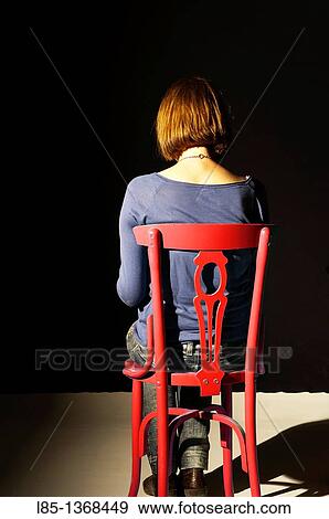 Girl sitting with her back View Large Photo Image Stock Photo - Girl sitting with her back. Fotosearch