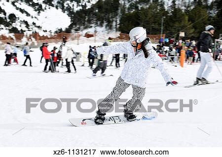 Girl snowboarding at the snow, Chica practicando snowboard en la nieve, Andorra, Europe View Large Photo Image Stock Photo - Girl snowboarding at the snow, Chica practicando snowboard en la nieve, Andorra, Europe. Fotosearch