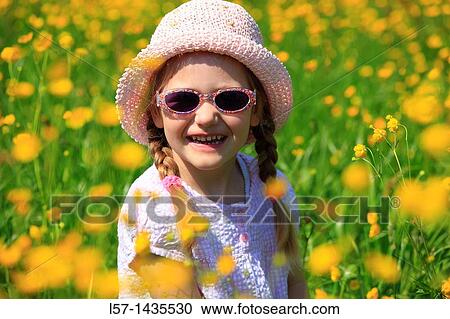 girl standing in blooming field View Large Photo Image Stock Image - girl standing in blooming field. Fotosearch