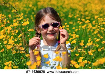 girl standing in blooming field View Large Photo Image Stock Photography - girl standing in blooming field. Fotosearch