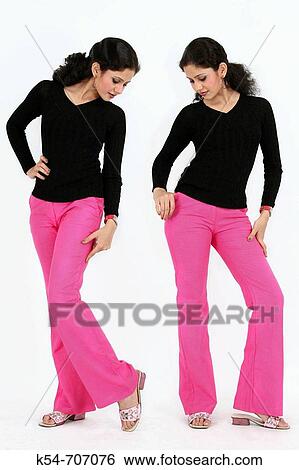 Girl standing in western outfits with pose against white background. View Large Photo Image Stock Photograph - Girl standing in western outfits with pose against white background.. Fotosearch