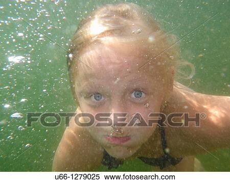 Girl swimming under water. View Large Photo Image Stock Photography - Girl swimming under water.. Fotosearch