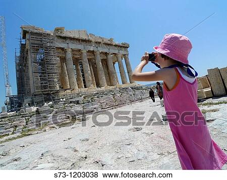 Girl taking pictures in the Acropolis, Athens, Greece View Large Photo Image Stock Photo - Girl taking pictures in the Acropolis, Athens, Greece. Fotosearch