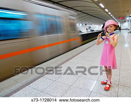 Girl taking pictures to Athens subway, Athens, Greece View Large Photo Image Picture - Girl taking pictures to Athens subway, Athens, Greece. Fotosearch