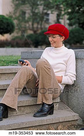 Girl texting on cellular View Large Photo Image Stock Image - Girl texting on cellular. Fotosearch
