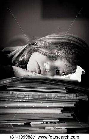Girl tired of studying View Large Photo Image Stock Photo - Girl tired of studying. Fotosearch