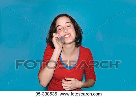 Girl using mobile phone View Large Photo Image Stock Photography - Girl using mobile phone. Fotosearch
