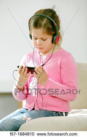 Girl using smartphone View Large Photo Image Stock Image - Girl using smartphone. Fotosearch