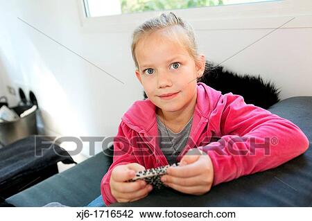 Stock Image - Girl using smartphone. Fotosearch