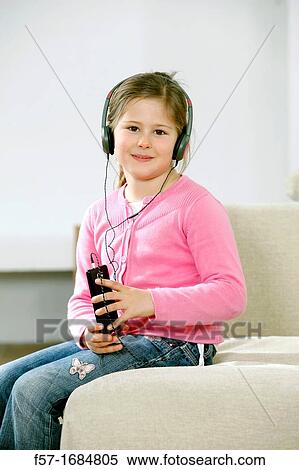 Girl using smartphone View Large Photo Image Stock Photography - Girl using smartphone. Fotosearch