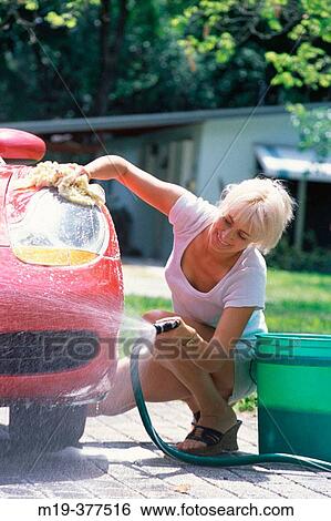 girl washing her car View Large Photo Image Stock Photograph - girl washing her car. Fotosearch