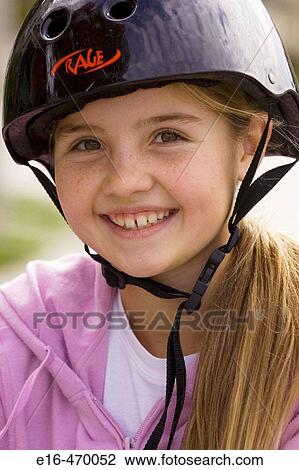 Girl wearing bike helmet View Large Photo Image Stock Image - Girl wearing bike helmet. Fotosearch
