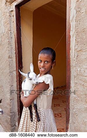 Girl with a little goat, Qalansiyah, Socotra island, listed as World Heritage by UNESCO, Aden Governorate, Yemen View Large Photo Image Stock Image - Girl with a little goat, Qalansiyah, Socotra island, listed as World Heritage by UNESCO, Aden Governorate, Yemen. Fotosearch