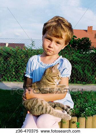 Girl with cat View Large Photo Image Stock Photography - Girl with cat. Fotosearch