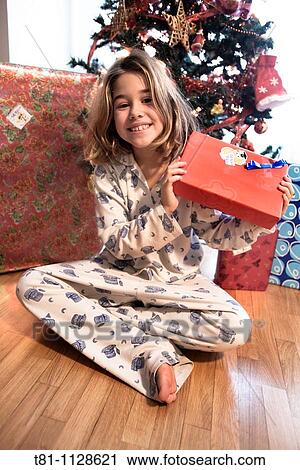 Girl with Christmas gifts View Large Photo Image Stock Image - Girl with Christmas gifts. Fotosearch