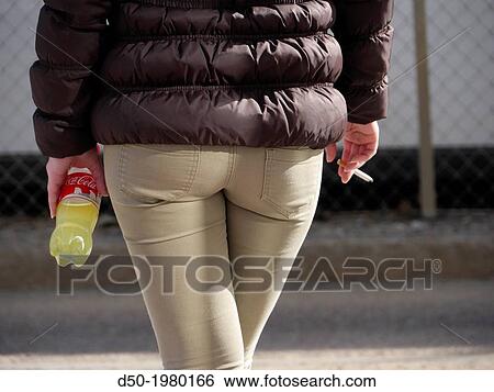 Girl with cigarette and Coke bottle, Stockholm, Sweden View Large Photo Image Stock Photograph - Girl with cigarette and Coke bottle, Stockholm, Sweden. Fotosearch