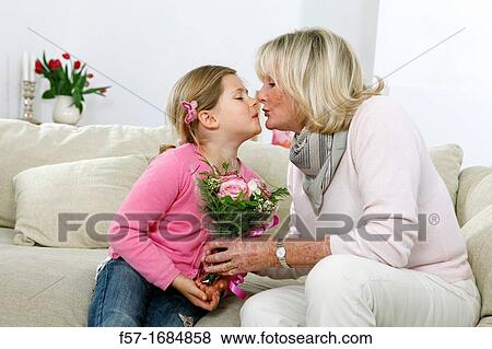Girl with grandmother View Large Photo Image Stock Photo - Girl with grandmother. Fotosearch