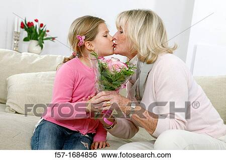 Girl with grandmother View Large Photo Image Stock Photograph - Girl with grandmother. Fotosearch