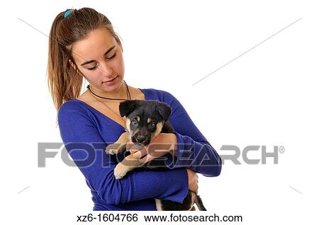 Stock Photograph - Girl with her dog pet. Fotosearch