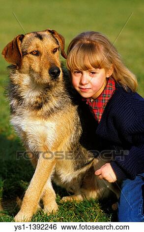Stock Photograph - Girl with her Domestic Dog. Fotosearch