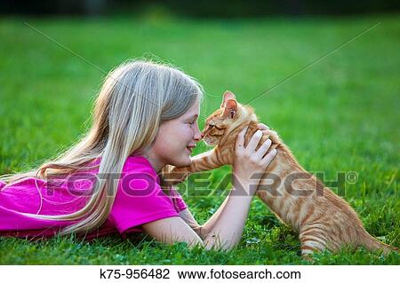 Girl with kitten View Large Photo Image Stock Image - Girl with kitten. Fotosearch