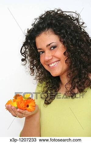 Girl with marigolds View Large Photo Image Stock Image - Girl with marigolds. Fotosearch