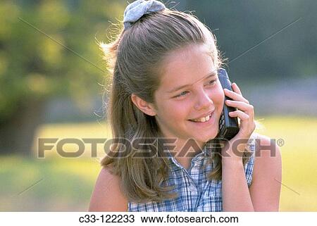 Girl with mobile phone View Large Photo Image Stock Image - Girl with mobile phone. Fotosearch
