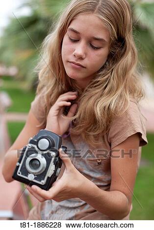 girl with photo camera, View Large Photo Image Stock Photo - girl with photo camera,. Fotosearch