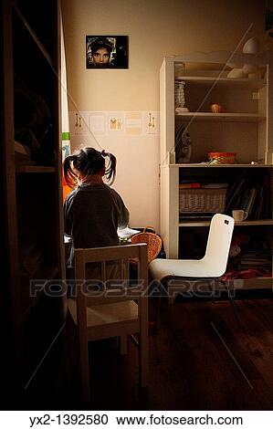 Girl with pigtails in her room View Large Photo Image Stock Image - Girl with pigtails in her room. Fotosearch