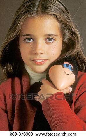 Stock Photo - Girl with puppet. Fotosearch